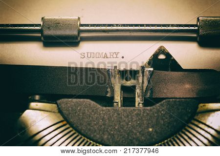 Old typewriter with the written word. Summary