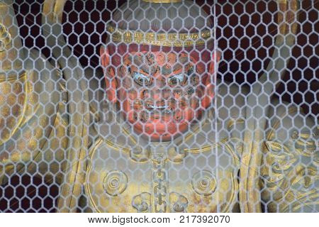 Tokyo , Japan - November 4 2017 : Caged Devil Statue At Japanese Temple Taken On November 4, 2017 At