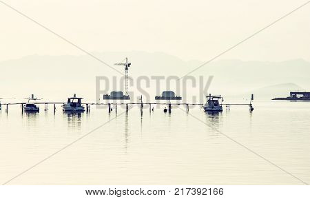 Construction of a new bridge from Trogir to the Ciovo island Croatia southern Europe. Old photo filter.