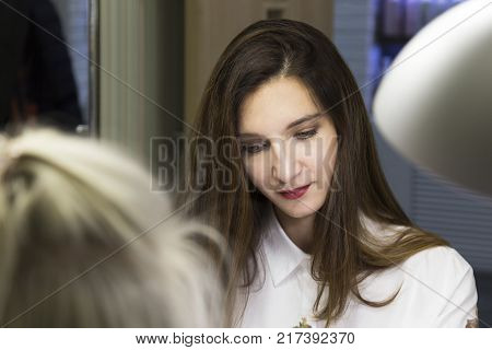 Cute Girl Master Doing A Manicure.