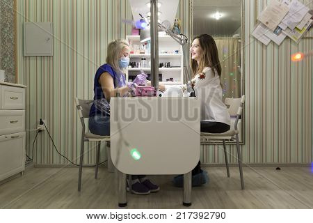 Cute Girl Master Doing A Manicure.