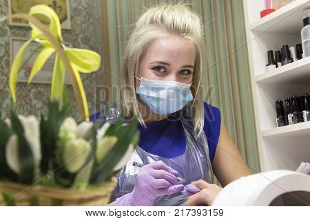 Cute Girl Master Doing A Manicure.