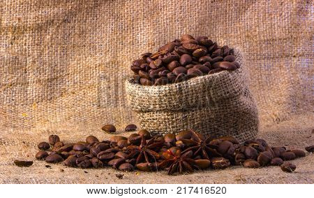 Coffee in a bag of deregie, on a yellow thick fabric.