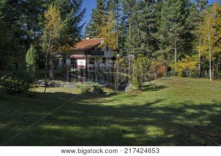 Forest house in the residential district of bulgarian village  Mala tsarkva, Rila mountain, Bulgaria