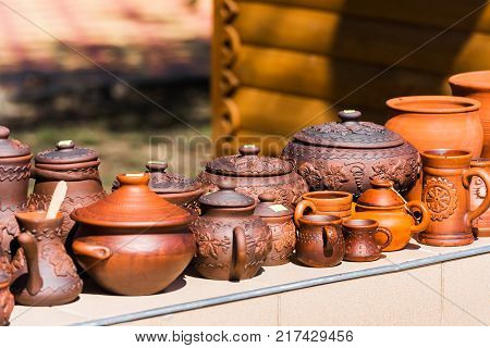 Many Pottery Are Sold On The Street In The City Park Goryachy Klyuch Russia. Copy Space For Text