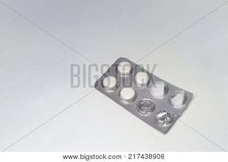 pills plate of antibiotics. clipped and half-empty
