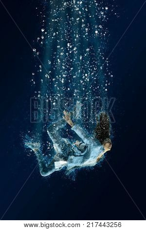 Woman is drowning under water. Horrible dream