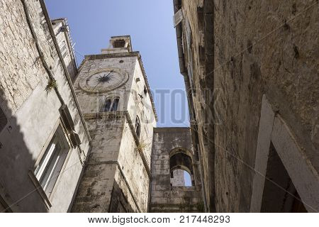 SPLIT, CROATIA - AUGUSt 11 2017: Looking up at the ancient tower clock of Split city in Croatia