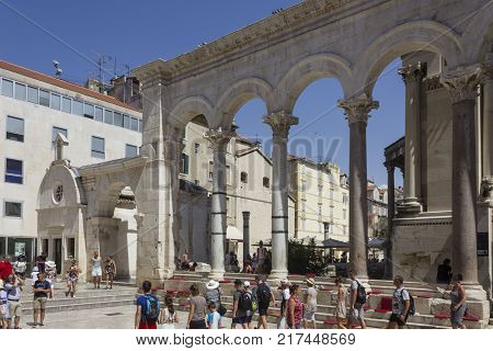 SPLIT, CROATIA - AUGUST 11 2017: People around the peristyle of Diocletian Palace in Split