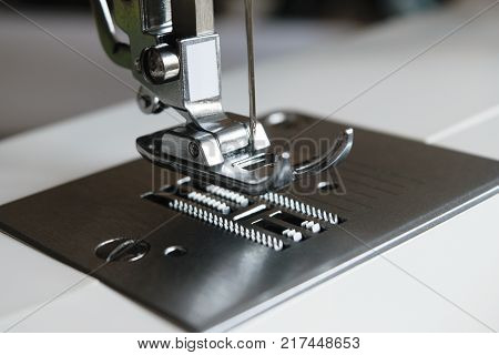 metal chrome parts of a sewing machine close-up