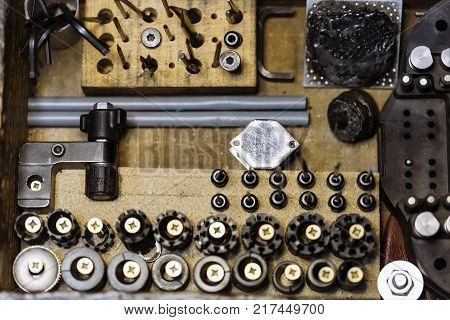Tools and accessories of jewelers used for crafting precious metals