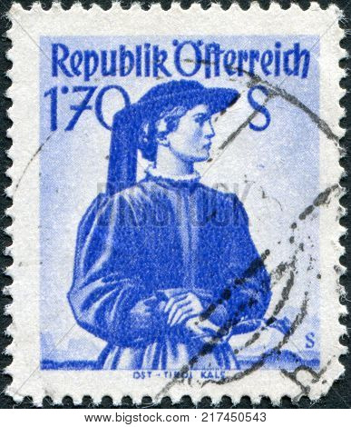 AUSTRIA - CIRCA 1950: A stamp printed in Austria shows a woman in national dress East Tyrol Kals circa 1950