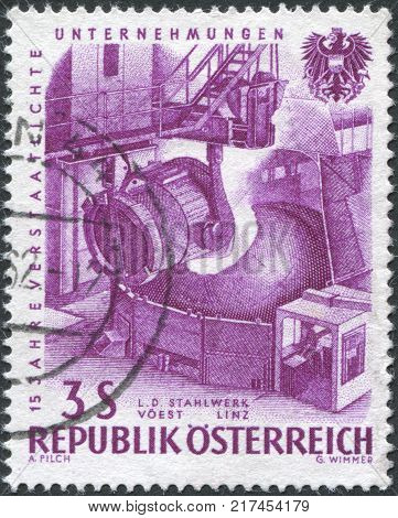AUSTRIA - CIRCA 1961: A stamp printed in Austria devoted to 15th anniversary of nationalized industry represented Pouring steel VOEST Linz circa 1961