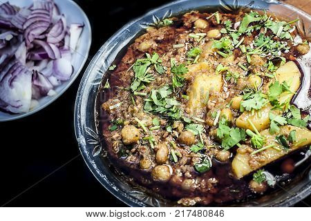 Popular Keema Masala Dish In  A Glass Plate.