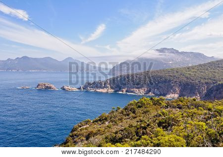 Light clouds over Carp Bay and The Hazards