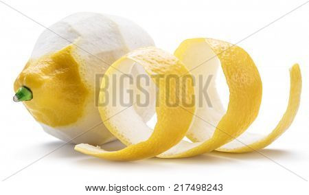 Peeled lemon and lemon pill on white background. Close-up.