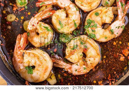 fresh shrimps casserole served with hot spices