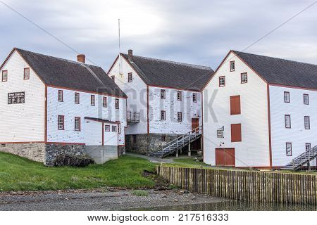 three large wood buildings along Newfoundland coastline at Bonavista