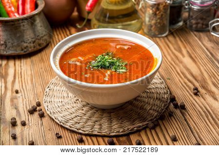 Kharcho soup with meat and rice on the plate
