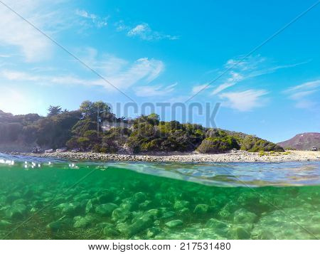 Split underwater view of La Speranza beach Sardinia