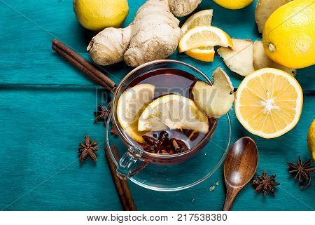 Cup Of Ginger Tea With Lemon And Honey On Dark Blue Background,