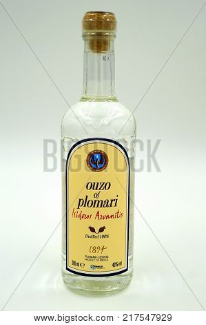 Almere, The Netherlands-  December 9, 2017: Bottle of famous Greek spirit Ouzo Plomari Isidoros from Arvanitis Distillery.
