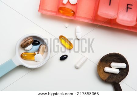 Medicine Measured Out For A Daily Dose To Take Tablets