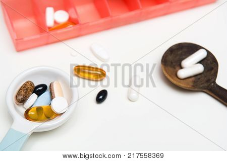 Medicine Measured Out For A Daily Dose To Take Tablets