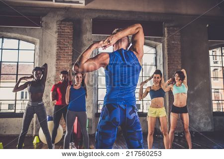 Athletes Training In A Gym