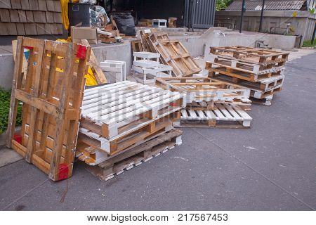 Stacks of old wood pallets at the park