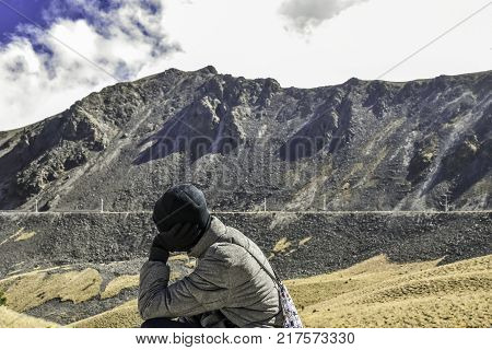 People walking Volcano Nevada de Toluca with lakes inside crater in Mexico