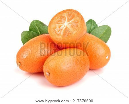 Cumquat or kumquat with leaf isolated on white background close up.
