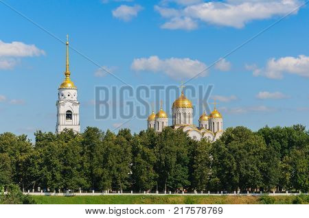 view of the Uspensky Cathedral and the boardwalk on the hill in Vladimir. summer landscape. the Golden ring of Russia