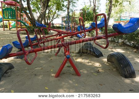 Older playground equipment in Ecuador, teeter-totter, seesaw