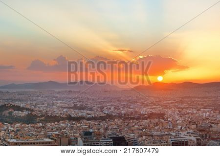 Athens skyline sunset viewed from Mt Lykavitos with Acropolis, Greece.