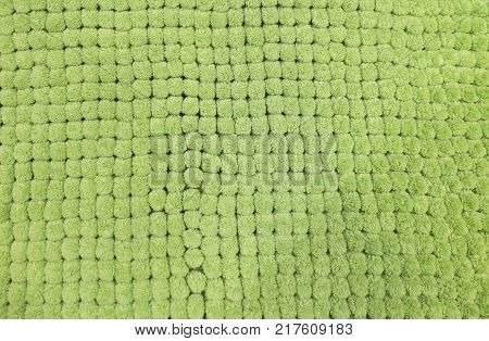 Fabric Texture Close Up of Green Plush Fabric Texture Pattern Background.