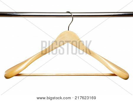 Wooden clothes hanger on metal crossbar isolated over white