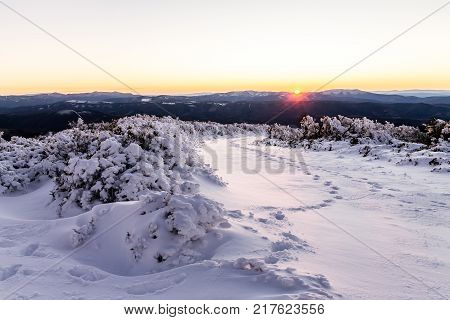 Sunset in the snowy mountains of Ancares Galicia Spain