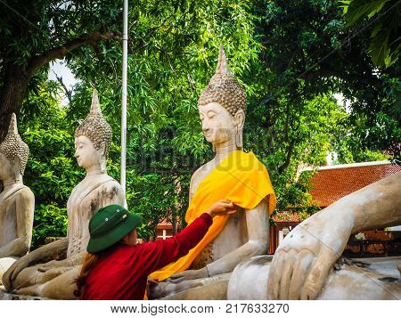 Thai People Change Robe Of A Buddhist Monk At Wat Yai Chaimongkol,ayuttaya Province,thailand On 18 N