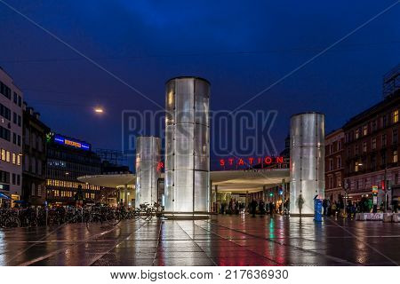 The Norreport station at night. People walking to the metro Copenhagen Denmark December 5 2017