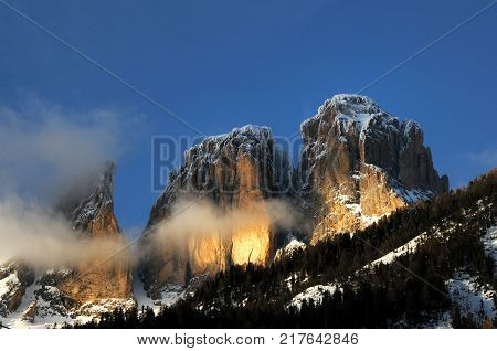 Beautiful view of Sassolungo (Langkofel) group in the Dolomites as seen from Campitello di Fassa. Val di Fassa, Italy