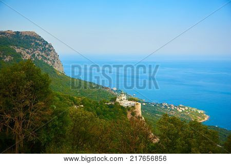 View from height to the church town and sea on the background