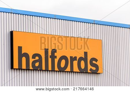 Northampton, UK - 29 OCTOBER 2017: Day view shot of Halfords logo in Sixfields Retail park.