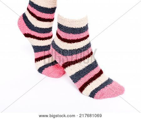 Multicolor women's fuzzy ankle socks with stripes isolated on white background