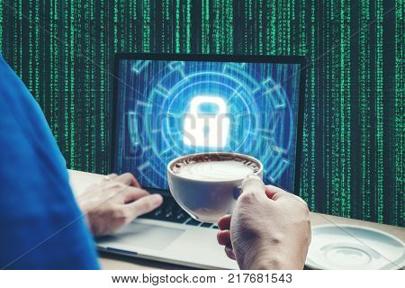 Businessman hand using laptop with Cyber security job business and  network server concept