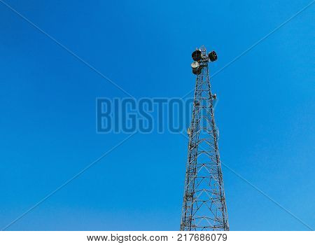 BLUE SKY WITH TELEVISION TOWER BROADCASTING SIGNAL