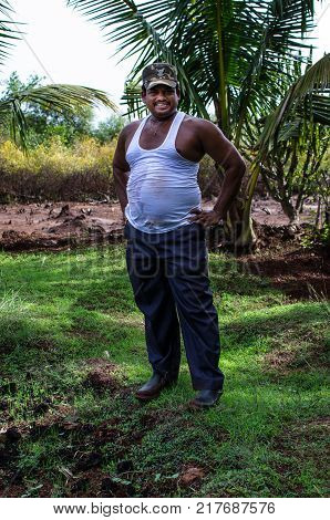 Farmer after hard work and sweat and labour
