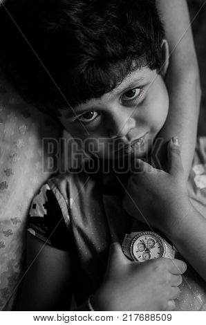 A girl with beautiful eyes a black and white portrait