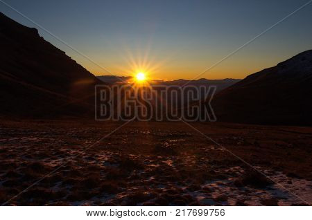 mountain sky peaks snow sun blue Armenia Aragats