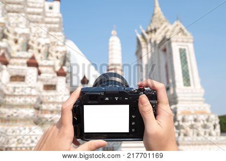 Digtial camera with blank white screen with white Pagoda view in Wat arun. Travel ads concept
